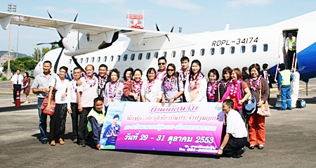 History being made - passengers prepare to board Laos Airlines flight QV410 from U-Tapao to Luang Prabang in Laos, becoming the first to do so.